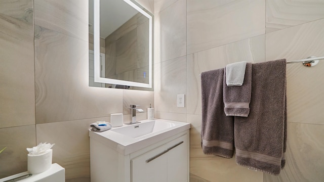 890 A1A Beach Blvd Unit 59, Saint Augustine, FL 32080 - bathroom with tile walls and vanity