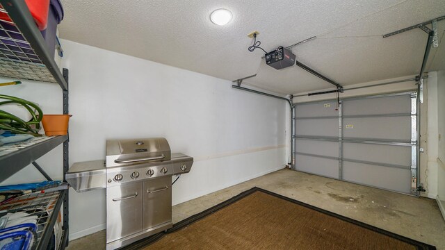 890 A1A Beach Blvd Unit 59, Saint Augustine, FL 32080 - garage with a garage door opener and baseboards