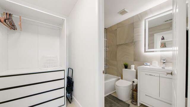 890 A1A Beach Blvd Unit 59, Saint Augustine, FL 32080 - full bathroom featuring vanity and washtub / shower combination