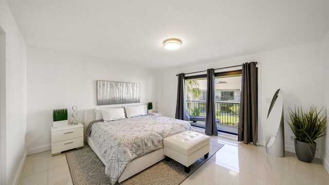 890 A1A Beach Blvd Unit 59, Saint Augustine, FL 32080 - bedroom featuring access to exterior and light tile patterned floors