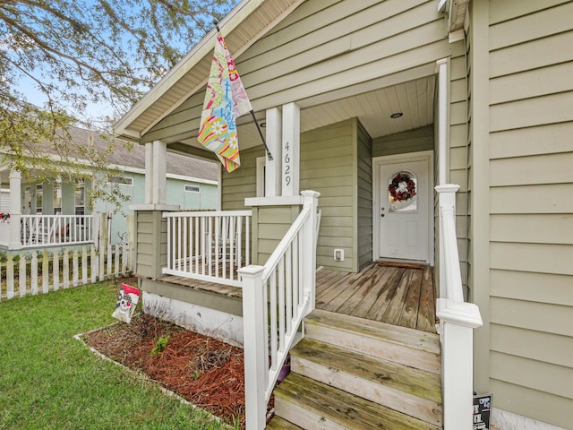 entrance to property with a porch