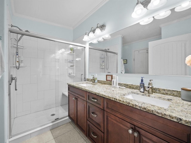 bathroom with tile patterned flooring, vanity, and ornamental molding