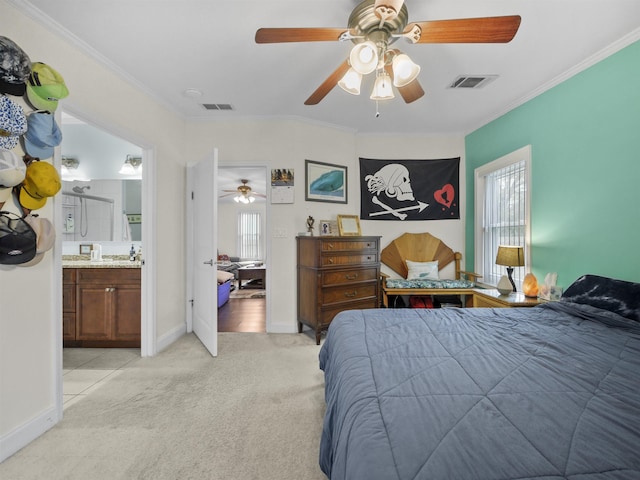 carpeted bedroom featuring ceiling fan, ornamental molding, and connected bathroom