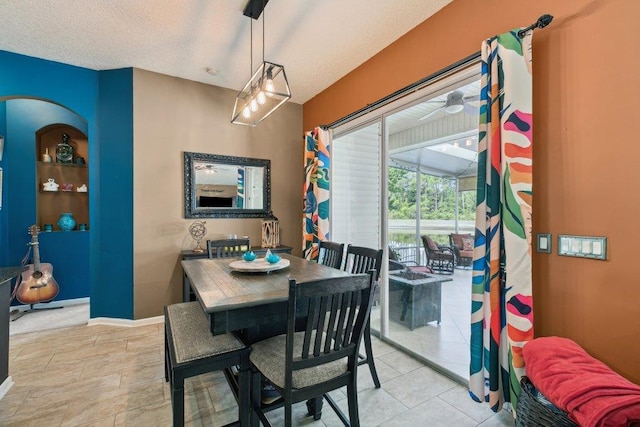 241 N Hidden Tree Dr, Saint Augustine, FL 32086 - dining space featuring a ceiling fan and baseboards