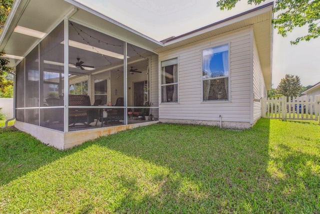 241 N Hidden Tree Dr, Saint Augustine, FL 32086 - back of property featuring a sunroom and ceiling fan