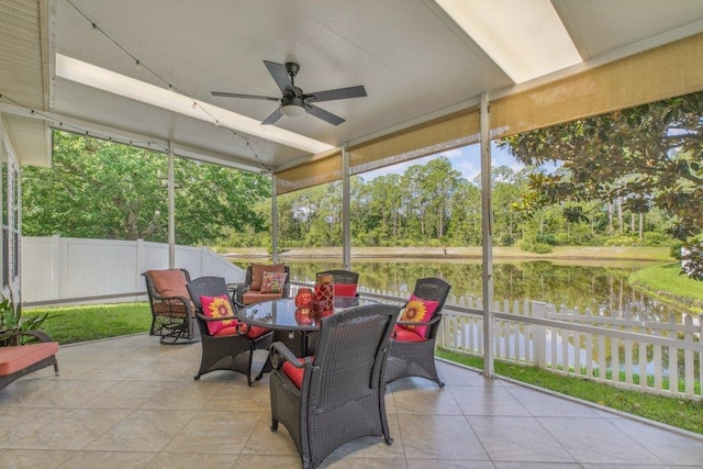 241 N Hidden Tree Dr, Saint Augustine, FL 32086 - sunroom / solarium with ceiling fan, view of wooded area, and outdoor dining area