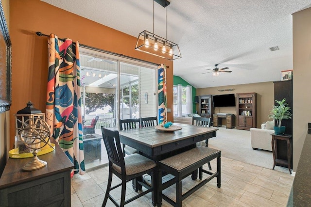241 N Hidden Tree Dr, Saint Augustine, FL 32086 - dining room featuring a textured ceiling, ceiling fan, and vaulted ceiling