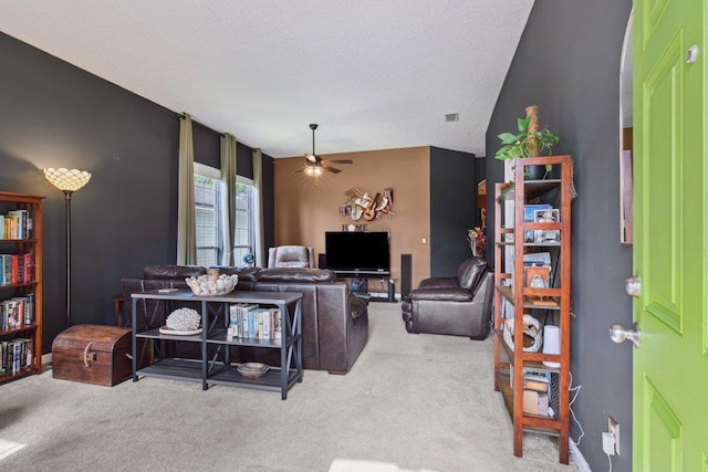 241 N Hidden Tree Dr, Saint Augustine, FL 32086 - living room featuring carpet, a ceiling fan, and a textured ceiling