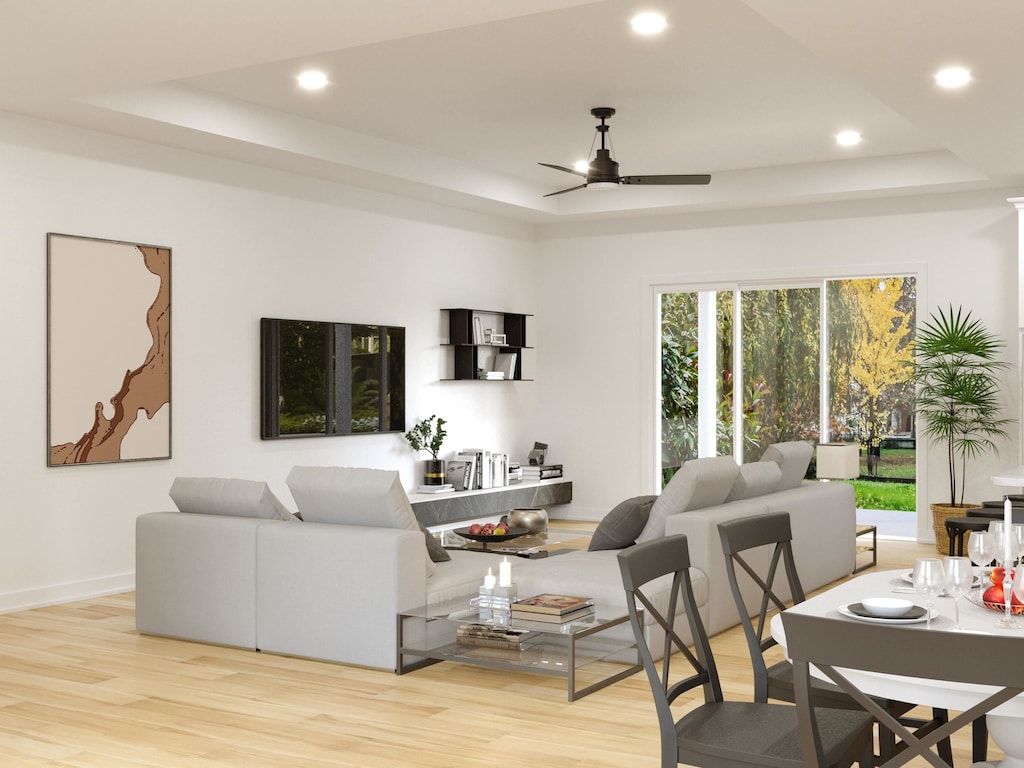 16 Baru Rd, Saint Augustine, FL 32080 - living area featuring ceiling fan, wood finished floors, a tray ceiling, and recessed lighting