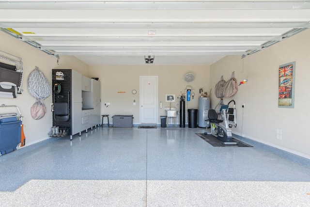 garage featuring water heater