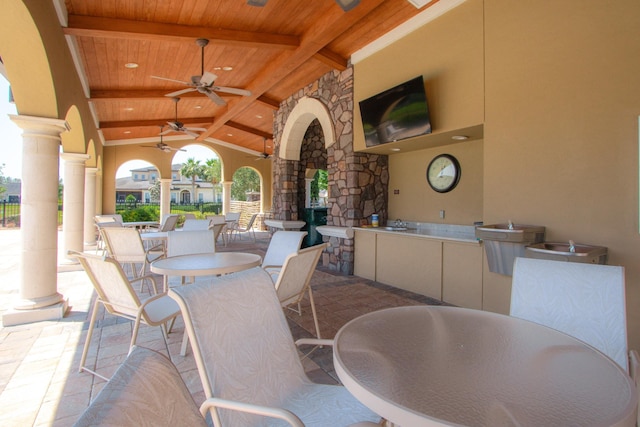 view of patio with ceiling fan