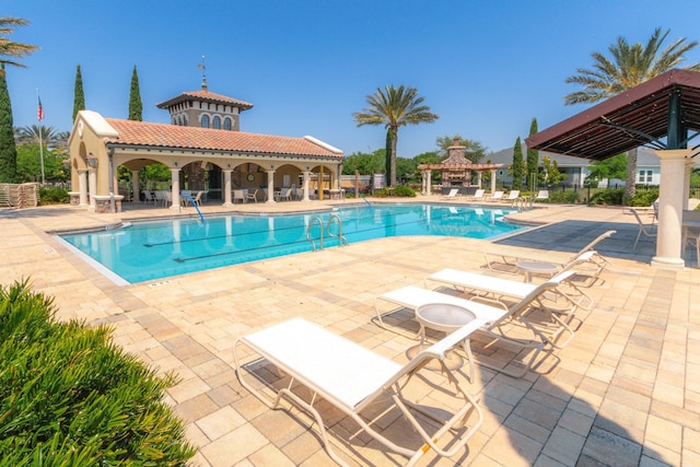 view of pool with a gazebo and a patio