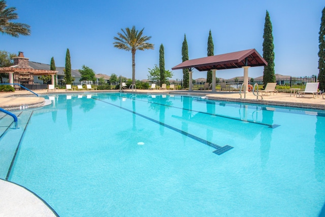 view of swimming pool featuring a gazebo