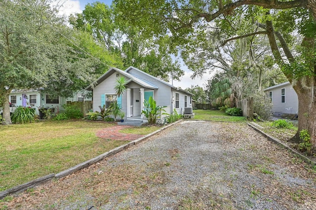 bungalow with a front lawn