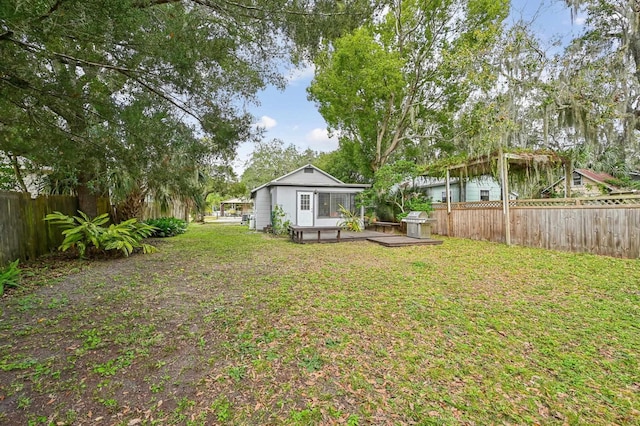 view of yard featuring a deck