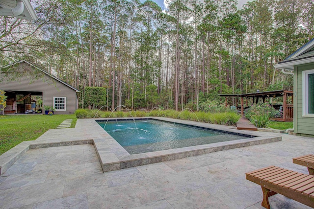 outdoor pool featuring a yard and a patio