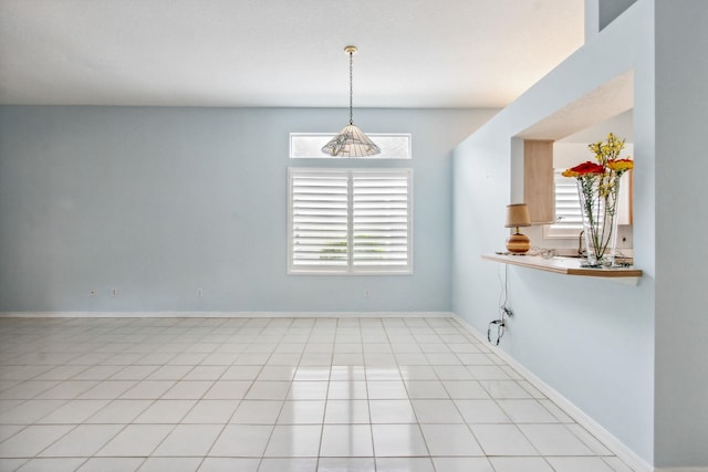 view of tiled spare room