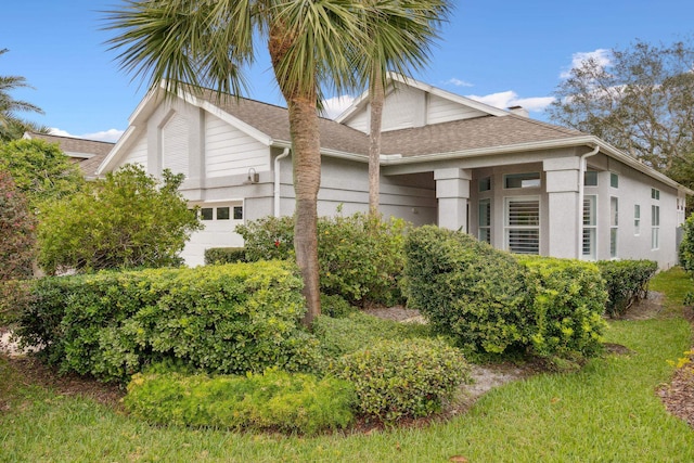 view of home's exterior with a garage