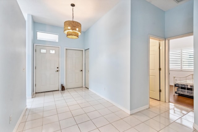 foyer with light tile patterned flooring