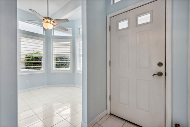 entrance foyer featuring ceiling fan and light tile patterned floors