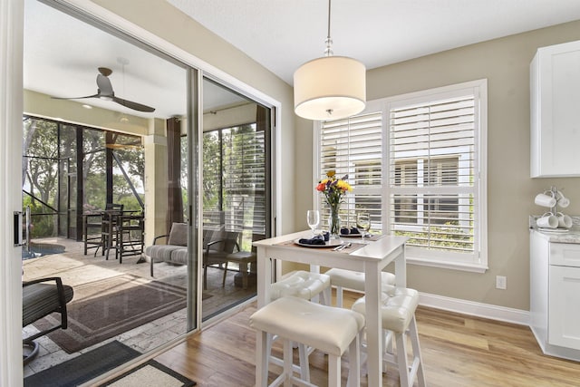 1125 S Marsh Wind Way, Ponte Vedra Beach, FL 32082 - dining area with baseboards, a ceiling fan, light wood-style flooring, and a wealth of natural light