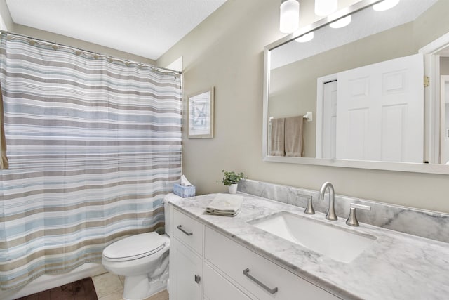 1125 S Marsh Wind Way, Ponte Vedra Beach, FL 32082 - full bath with a shower with curtain, a textured ceiling, tile patterned floors, vanity, and toilet