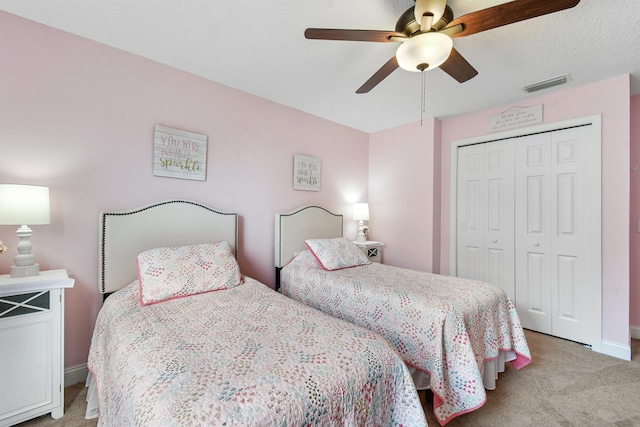 1125 S Marsh Wind Way, Ponte Vedra Beach, FL 32082 - bedroom with visible vents, a closet, light carpet, baseboards, and ceiling fan