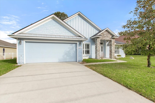 craftsman house featuring a garage and a front yard