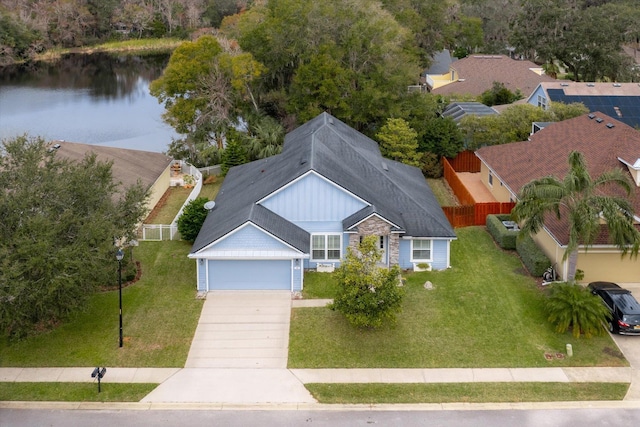 bird's eye view with a water view