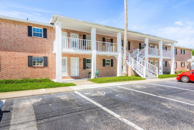 317 Flagler Blvd Unit 3A, Saint Augustine, FL 32080 - view of property featuring uncovered parking and stairs