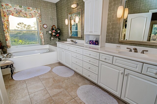 413 Fiddlers Point Dr, Saint Augustine, FL 32080 - full bath featuring double vanity, a bath, and tile patterned flooring