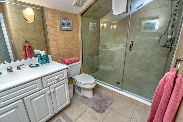 413 Fiddlers Point Dr, Saint Augustine, FL 32080 - bathroom with a shower stall, toilet, vanity, and tile patterned floors