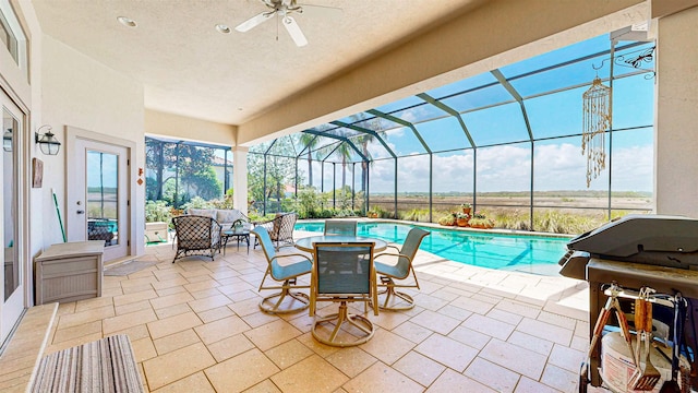 413 Fiddlers Point Dr, Saint Augustine, FL 32080 - swimming pool featuring a patio area, a ceiling fan, a lanai, and grilling area
