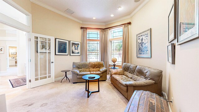 413 Fiddlers Point Dr, Saint Augustine, FL 32080 - living area with crown molding, baseboards, light colored carpet, a textured ceiling, and recessed lighting
