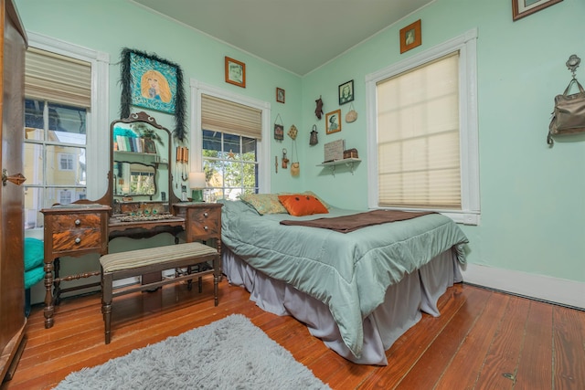 bedroom with wood-type flooring