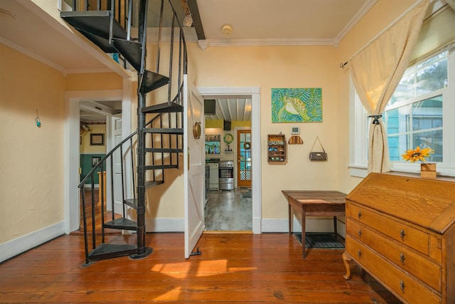 interior space with crown molding and hardwood / wood-style flooring