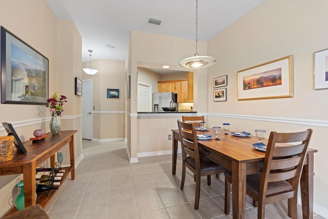 view of tiled dining space