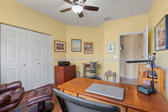 office area with hardwood / wood-style floors and ceiling fan