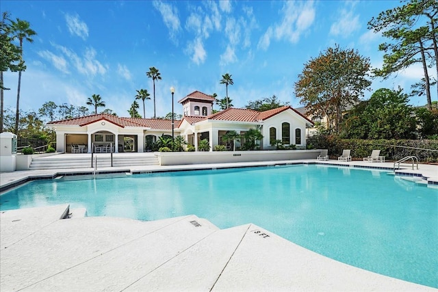 view of pool featuring a patio