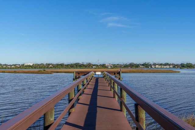 view of dock with a water view