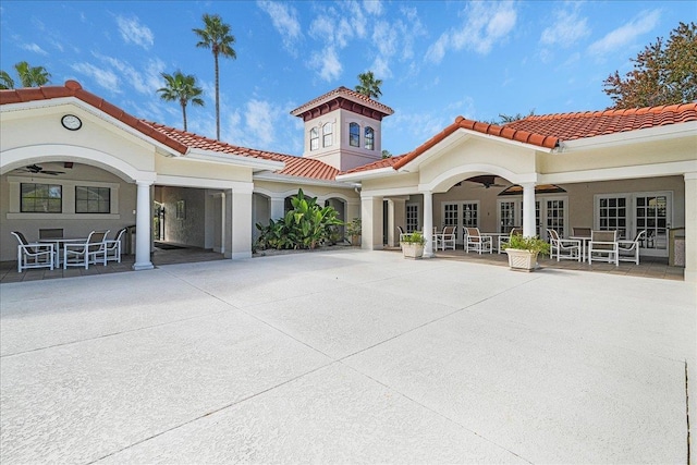 back of house with french doors and a patio area