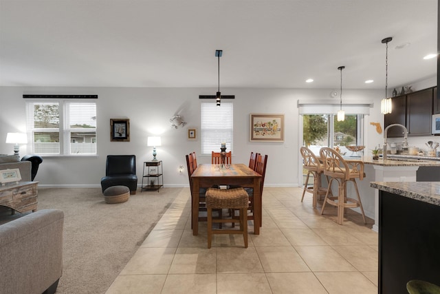 dining area with light carpet