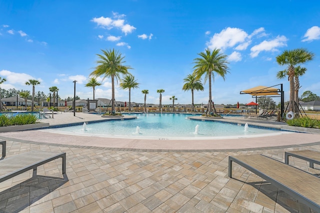 pool featuring a patio area