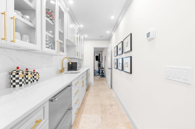 248 Marshside Dr, Saint Augustine, FL 32080 - bar featuring a sink, backsplash, baseboards, ornamental molding, and recessed lighting