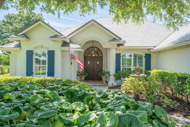 248 Marshside Dr, Saint Augustine, FL 32080 - view of exterior entry with stucco siding
