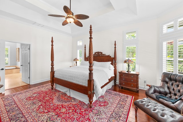 248 Marshside Dr, Saint Augustine, FL 32080 - bedroom with a tray ceiling, wood finished floors, ornamental molding, baseboards, and ensuite bathroom