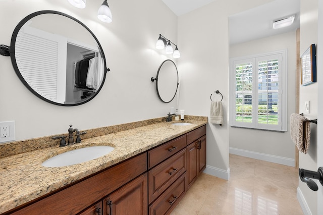 248 Marshside Dr, Saint Augustine, FL 32080 - full bathroom featuring double vanity, baseboards, and tile patterned flooring