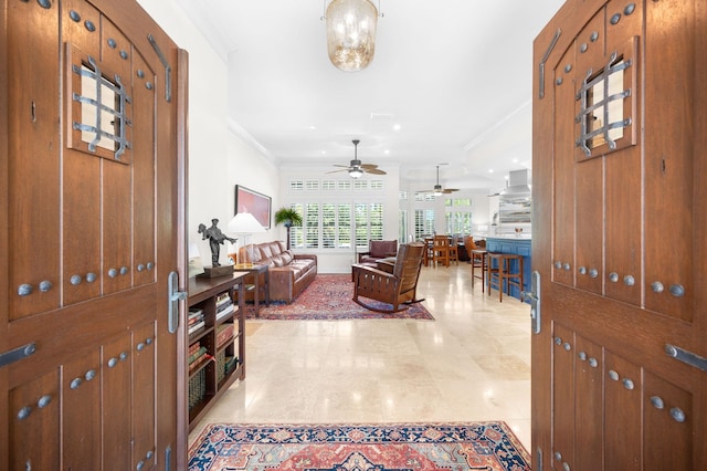 248 Marshside Dr, Saint Augustine, FL 32080 - foyer with ornamental molding and a ceiling fan