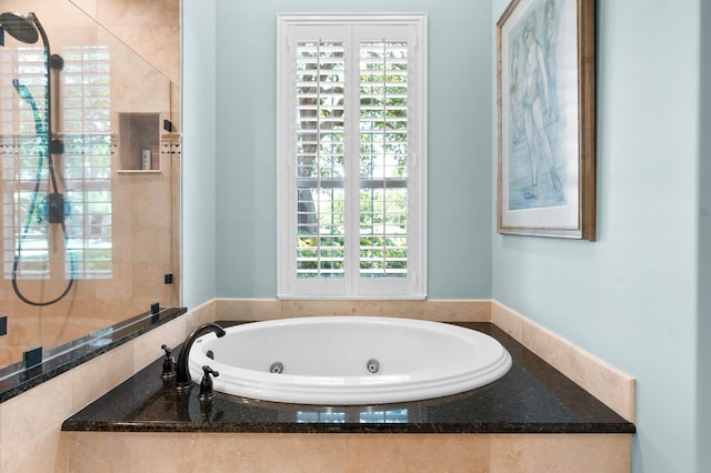 248 Marshside Dr, Saint Augustine, FL 32080 - full bath with a whirlpool tub, plenty of natural light, and a tile shower