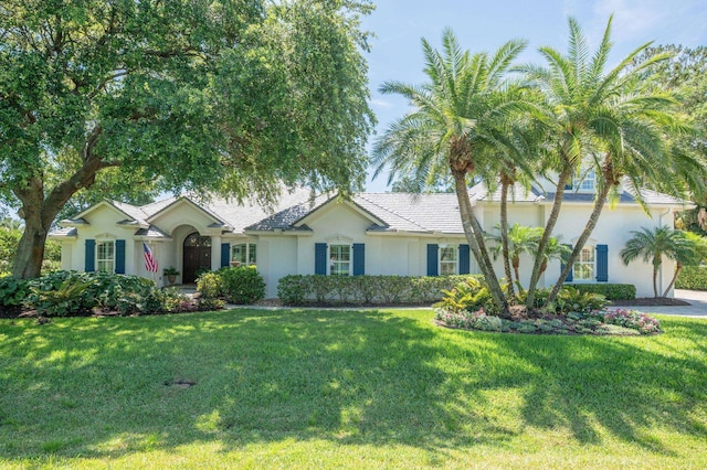 248 Marshside Dr, Saint Augustine, FL 32080 - single story home featuring stucco siding and a front lawn